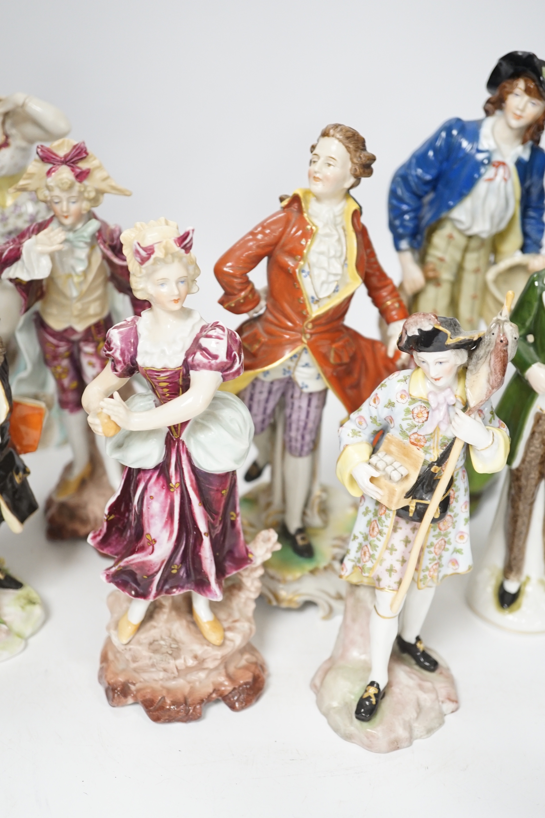 Eight Continental porcelain figures, 19th/20th century, tallest 24cm high